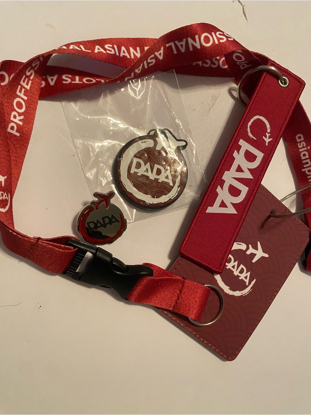Red PADA Branded Lanyard with Badge Holder and Pins
